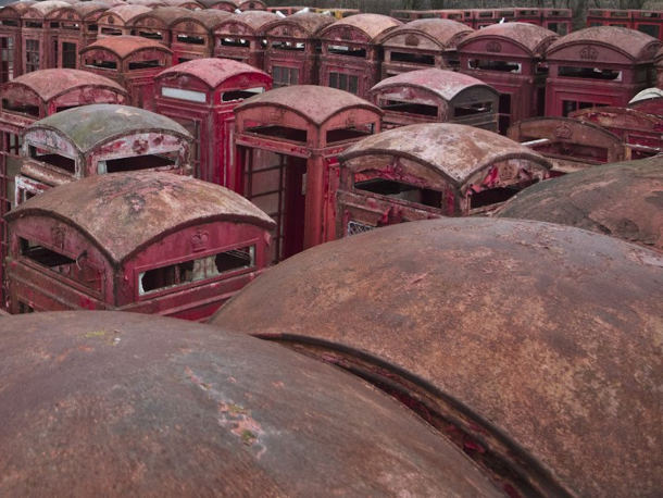 A graveyard of red telephone boxes in Carlton Miniott northern England  Photograph by Nicolas Ritter