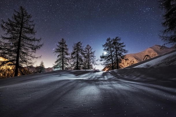 A magical night sky over snowy Foppolo Italy  photo by Davide Arizzi
