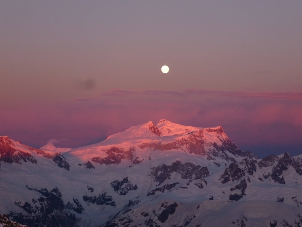 Moon setting over the Andes as seen from a Chilean Peak at sunrise 