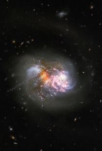 - Clash of the Titans- A cataclysmic cosmic collision takes centre stage in this Picture of the Week The image features the interacting galaxy pair IC  which lies around  million light-years away in the constellation Cetus The Whale