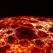  cyclonic features that surround a cyclone about  kilometers in diameter just offset from Jupiters geographic North Pole