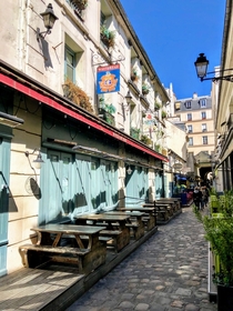  France - Paris - Passage of the Cour du commerce Saint Andre You will find it at number  boulevard de Saint-Germain Danton lived there for the last  years which legitimizes his statue on the boulevard median In this pleasant passage nestles the famous re