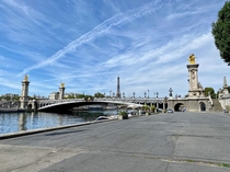  France - Paris - The Alexandre III bridge with gray and gold decor and ornate candelabra