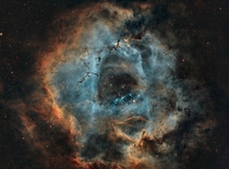  hours of data of the Rosette Nebula processed in a modified Hubble palette x-post from rspace 