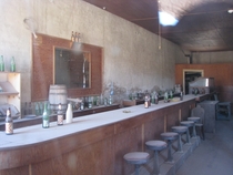 A bar in the ghost town of Bodie CA through the front window