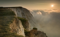 A blanket of thick fog descends on Beachy Head in East Sussex by Adam Barnes 