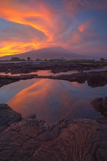 A blazing sunrise and Mauna Loa Hawaiis Big Island during the Lower Puna eruption June of  