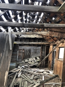 A clapboard shack in central Oregon You can see the shingles where the original structure was added onto in the bottom you can see the fencing as the building boarders property and the owner did not think it worth it to tear the structure down