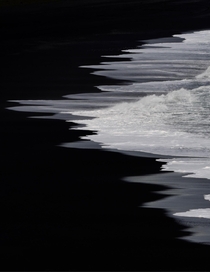 A color photo of a black sand lava beach in Iceland  - more of my abstract landscapes at insta glacionaut