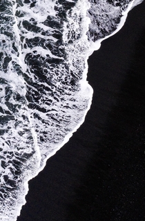 A colorfoto of a breaking wave on a black lava sand beach in Iceland  - more of my abstract landscapes on Insta glacionaut