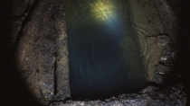 A flooded vertical shaft in an abandoned copper mine 