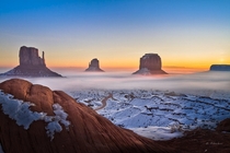 A foggy sunrise on Monument Valley Utah  photo by Dominique Palombieri