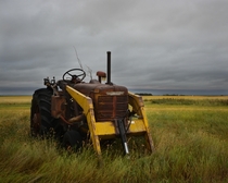A forgotten tractor a remnant of the past on the prairies OC