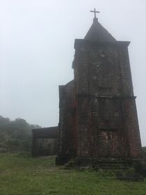 A French colonial church in the mist on Bokor Mountain Cambodia 