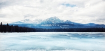 A frozen Annette Lake in Jasper National Park Canada 