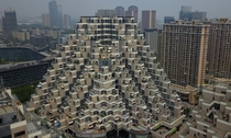 A gigantic pyramid shaped residential building from Kunshan China 
