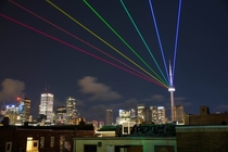 A laser rainbow focusing on Torontos CN Tower during Nuit Blanche 
