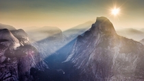 A light fog amplified shadows of Half Dome and Clouds rest making for a spectacular sunrise Yosemite CA 