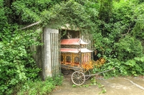 A long forgotten funeral carriage I found in an overgrown shed in Vietnam OC
