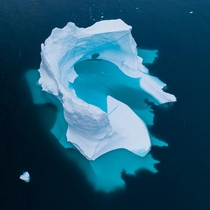A Massive piece of ice as seen from the sky in Greenland x