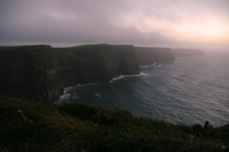 A misty sunset over the Cliffs of Moher Ireland 