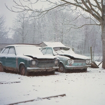 A pair of abandoned Ford Escorts close to where I live Shot this photo on film using an old Rolleiflex camera