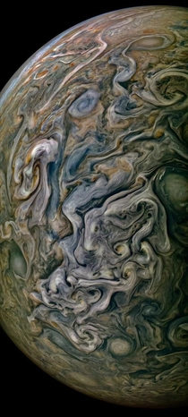 A photo from NASAs Juno is more like a painting