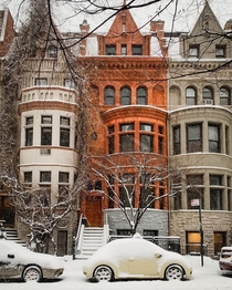 A pre-war Romanesque Revival brownstone in the snow Upper West Side Manhattan New York City