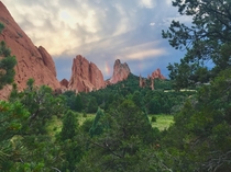 A rainbow between two rock formations in Garden of the Gods Colorado 