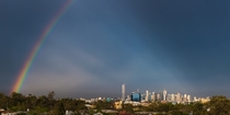 A rainbow dwarfs Brisbane City Australia 