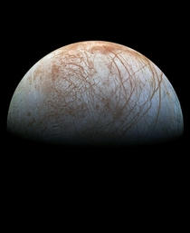 A remastered version of a picture showing Jupiters moon Europa taken by the Galileo spacecraft in the late s