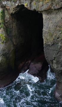 A sea cave along the cliff sides of Cape Flattery Makah Indian Reservation US  x