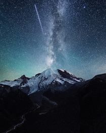 A shooting star over Mount Rainier  By Tanner Wendell Stewart