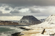 A side view of the iconic triangular Kirkjufell mountain in Iceland 