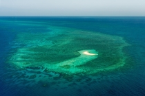 A small island in the Great Barrier Reef OC 