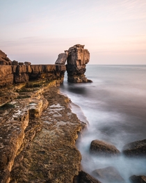 A soft sunset at the UKs Pulpit Rock in Dorset  IG pete_ell