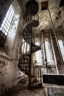 A spiral staircase in the abandoned Sleaford Bass Maltings malt house 