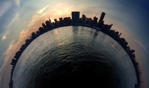 A stereographic panorama of Manhattans skyling shot from across the East River in Queens NY 