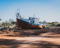 A stranded boat in a random village in cyprus 