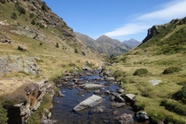 A trickle of water beginning its journey to the sea high in the Pyrenees Andorra 