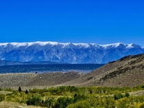 A view of the White Mountains and Owens Valley from the McGee Creek trail in the Sierra Nevada Mountains  x  