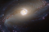 A wanderer dancing the dance of stars and space - barred spiral galaxy NGC  