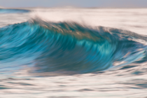 A wave at sunrise with a bit of slow shutter Sandy Beach Oahu Hawaii 