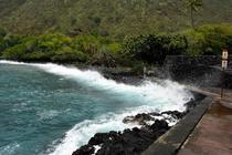 A wave hitting into Kealakekua Bay HI 