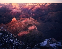A winter sunrise lights up the depths of the Grand Canyon - Arizona USA 