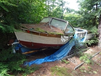 Abandoned boat by Lake Winnisquam New Hampshire  link to small album inside