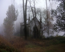Abandoned chapel in a foggy cemetery Anonymous Photographer 