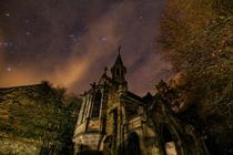 Abandoned church under the night sky in Belgium 