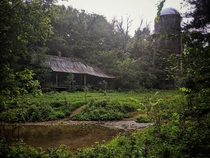 Abandoned Farm house by a creek Photo by Jennifer Wolfe 
