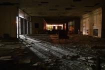 Abandoned hotel lobby at night 